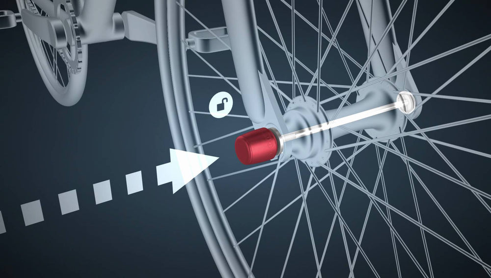 Graphic showing a NutFix Front Wheel Lock in the axle of a bike's front wheel.